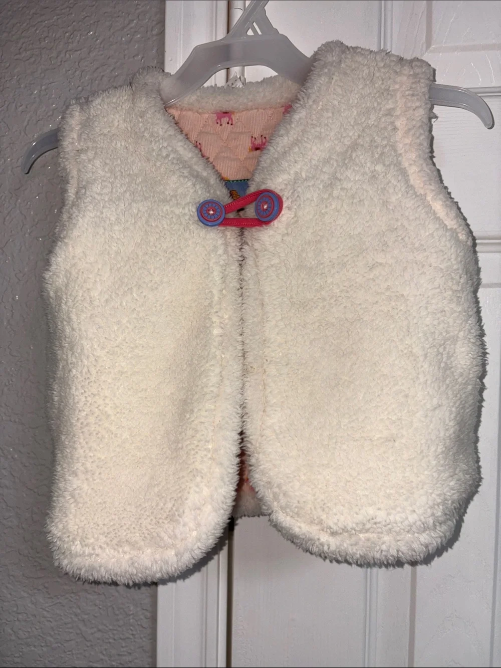 Matilda Jane Cream Sherpa Vest with Pink & Blue Button Accents